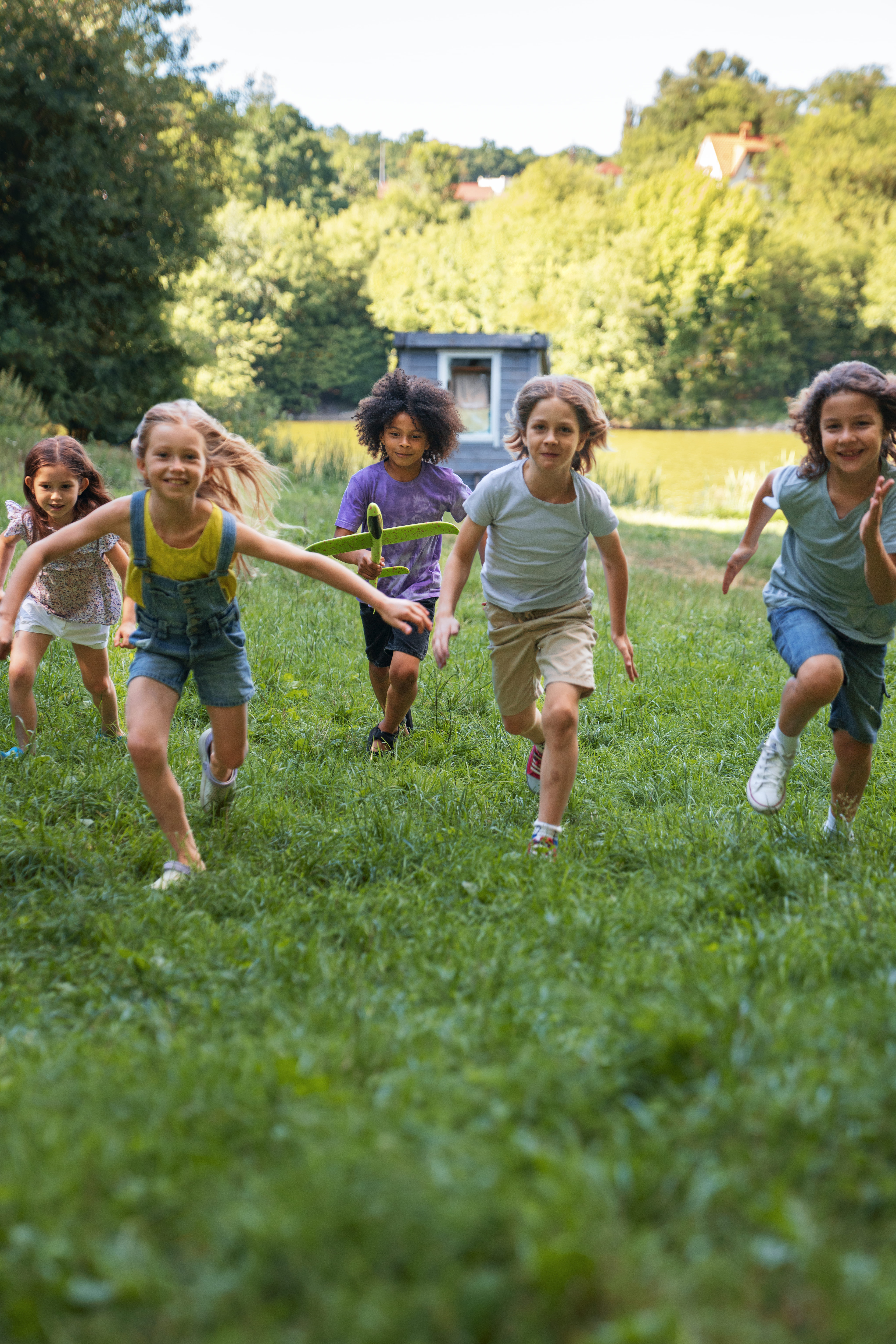 full shot kids running outdoors1